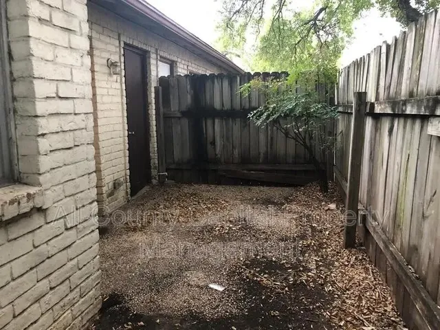a view of wooden fence