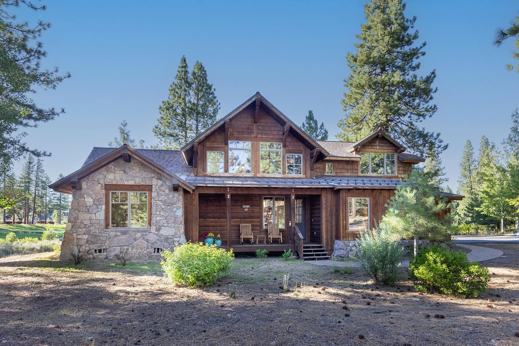 12202 Lookout Loop, Unit F2030 Truckee, CA 96161 - Photo 2 of 28 a front view of a house with garden