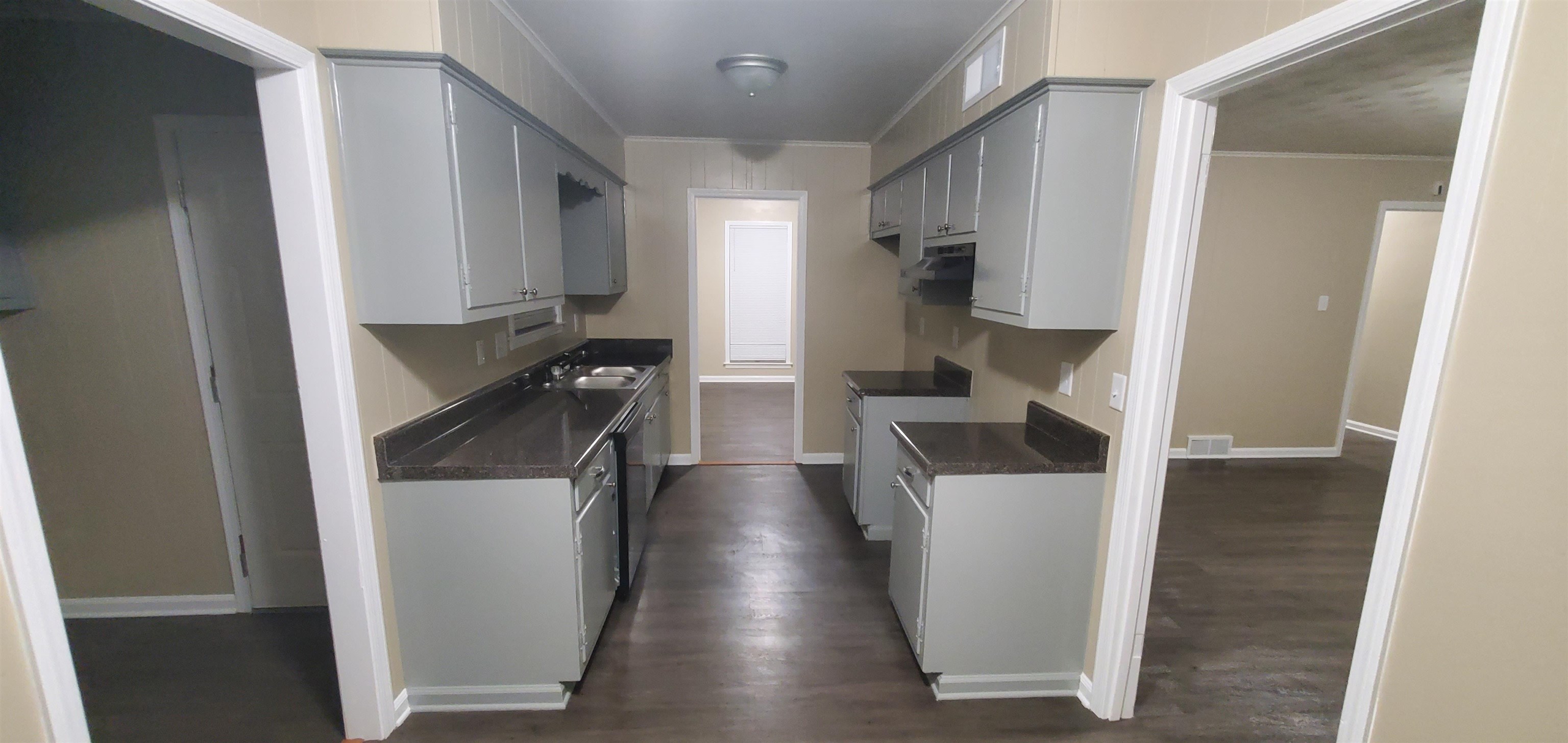 2843 Clarke Road Memphis, TN 38115 - Photo 8 of 10 a kitchen with stainless steel appliances a refrigerator and a stove