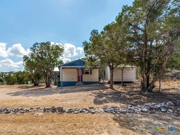 a house view with a outdoor space