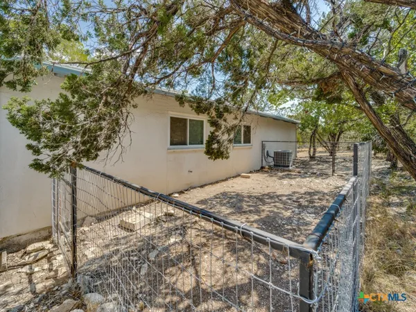 a house with trees in front of it