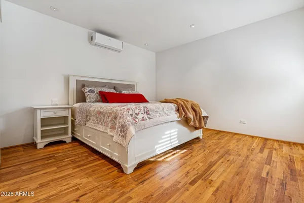 a bedroom with a bed and closet