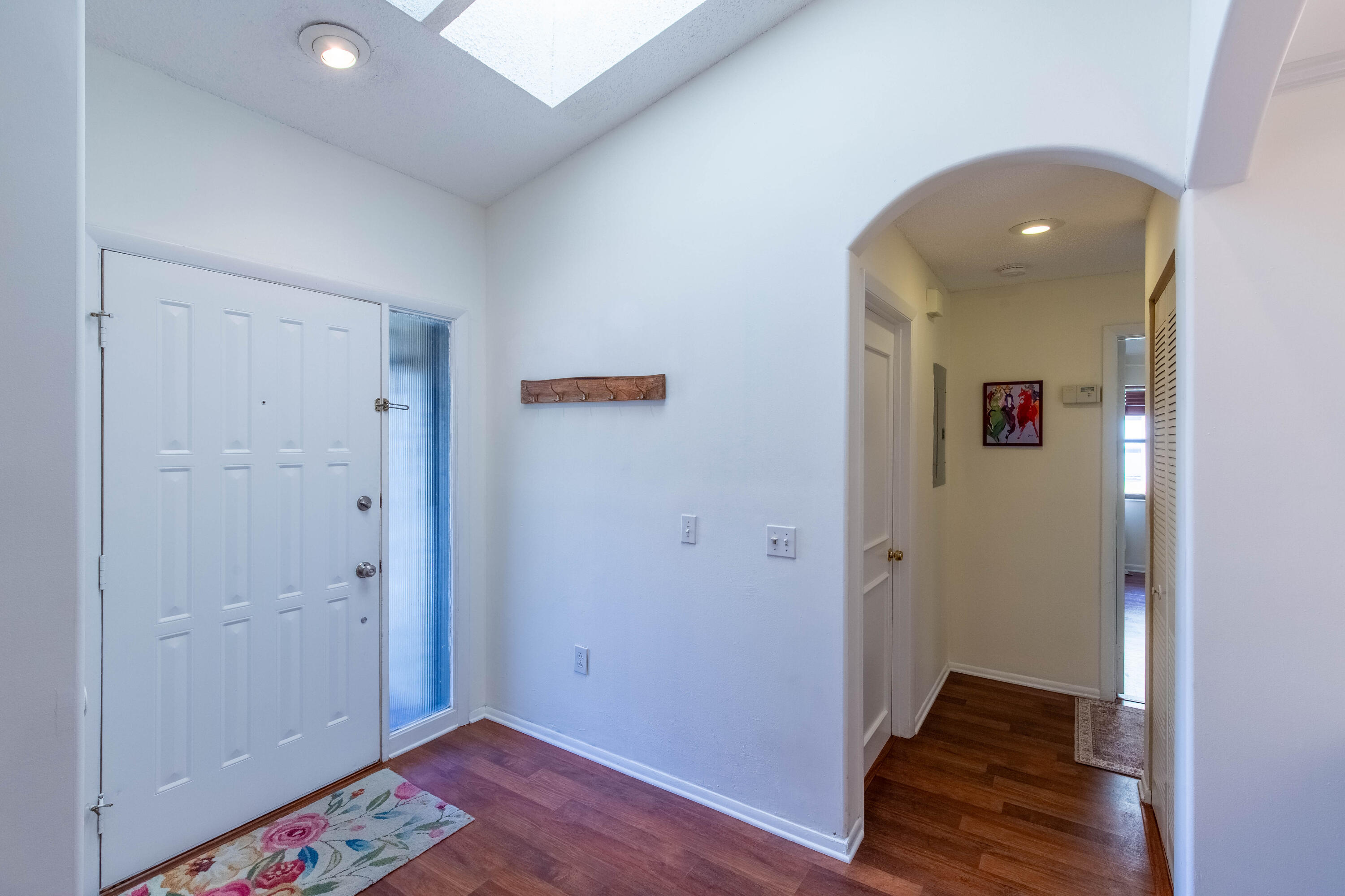 13165 Chadwick Court, Unit 32 Wellington, FL 33414 - Photo 12 of 25 a view of hallway with wooden floor