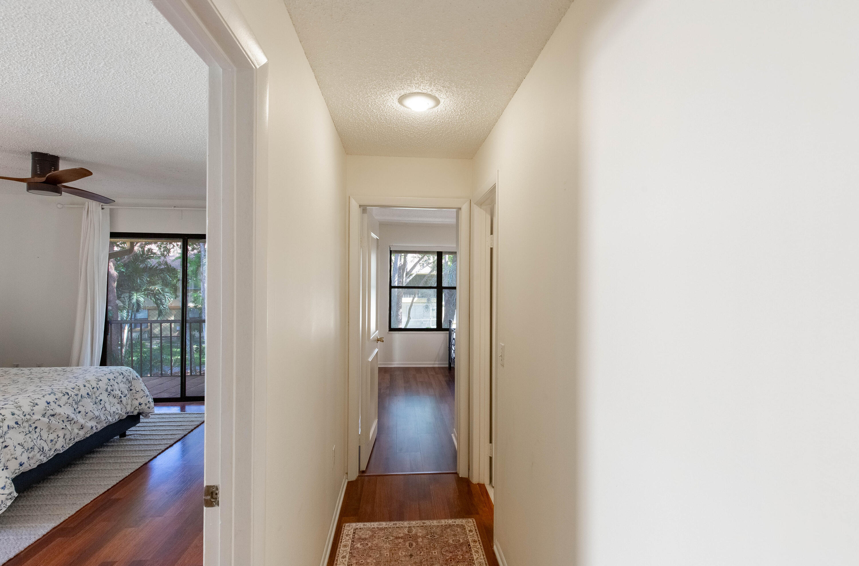 13165 Chadwick Court, Unit 32 Wellington, FL 33414 - Photo 14 of 25 a view of bedroom with bedroom and front door