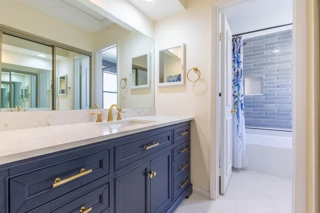 a bathroom with a toilet a sink and a bathtub