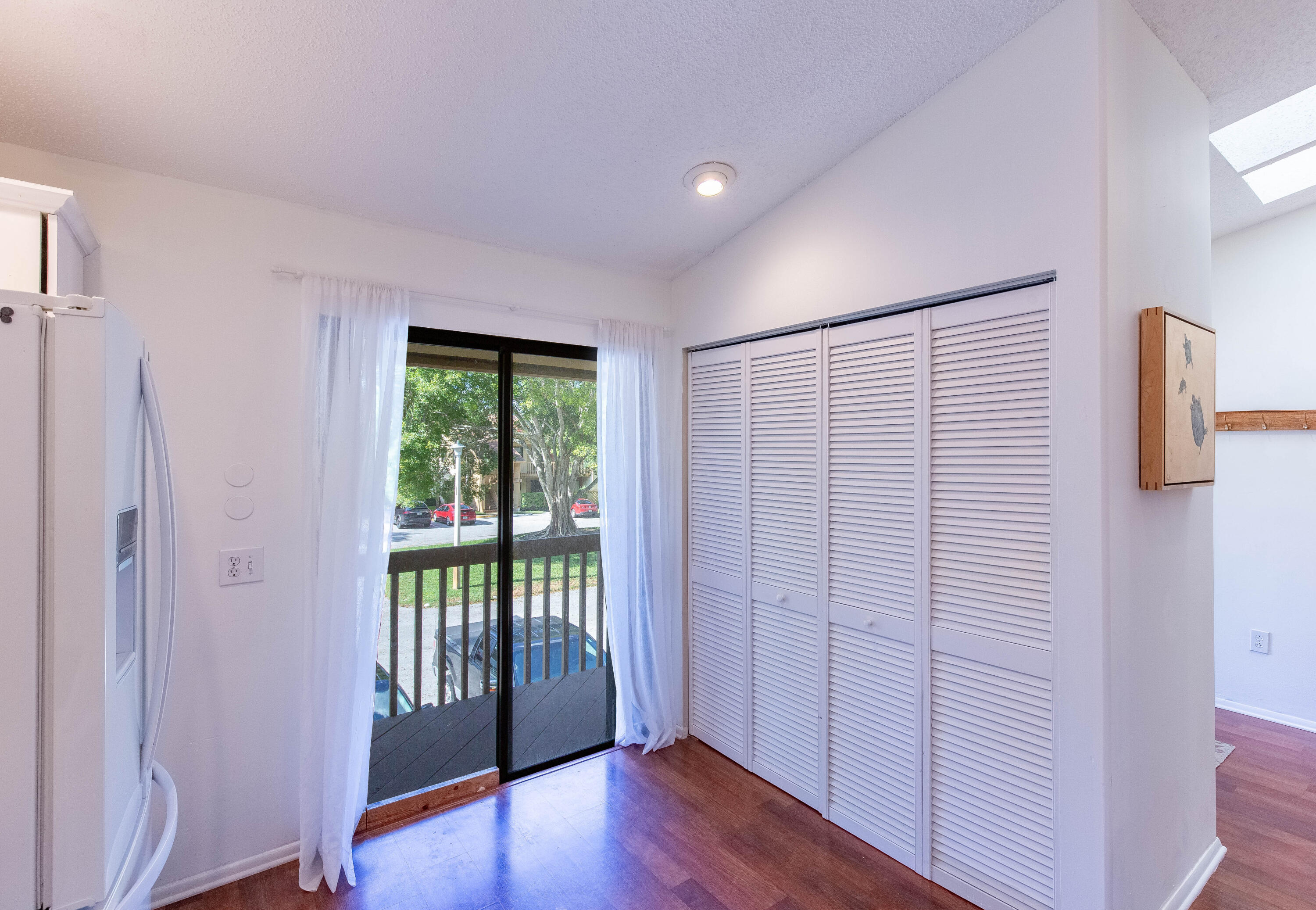 13165 Chadwick Court, Unit 32 Wellington, FL 33414 - Photo 10 of 25 a view of entryway with wooden floor