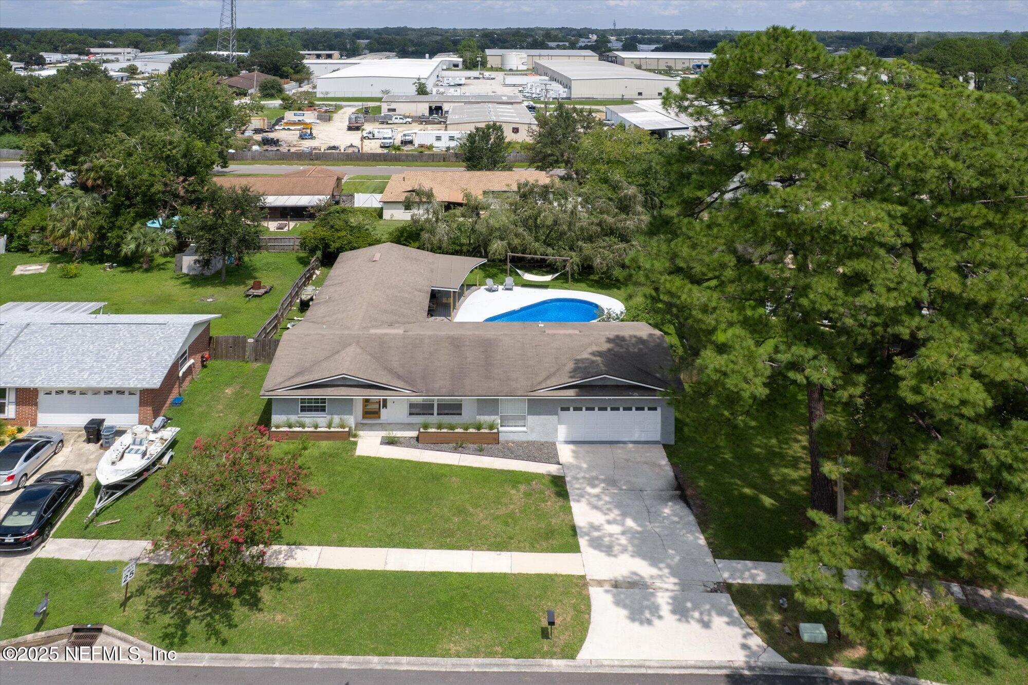 939 Grove Park Drive North Orange Park, FL 32073 - Photo 3 of 57 an aerial view of a house with garden space sitting space