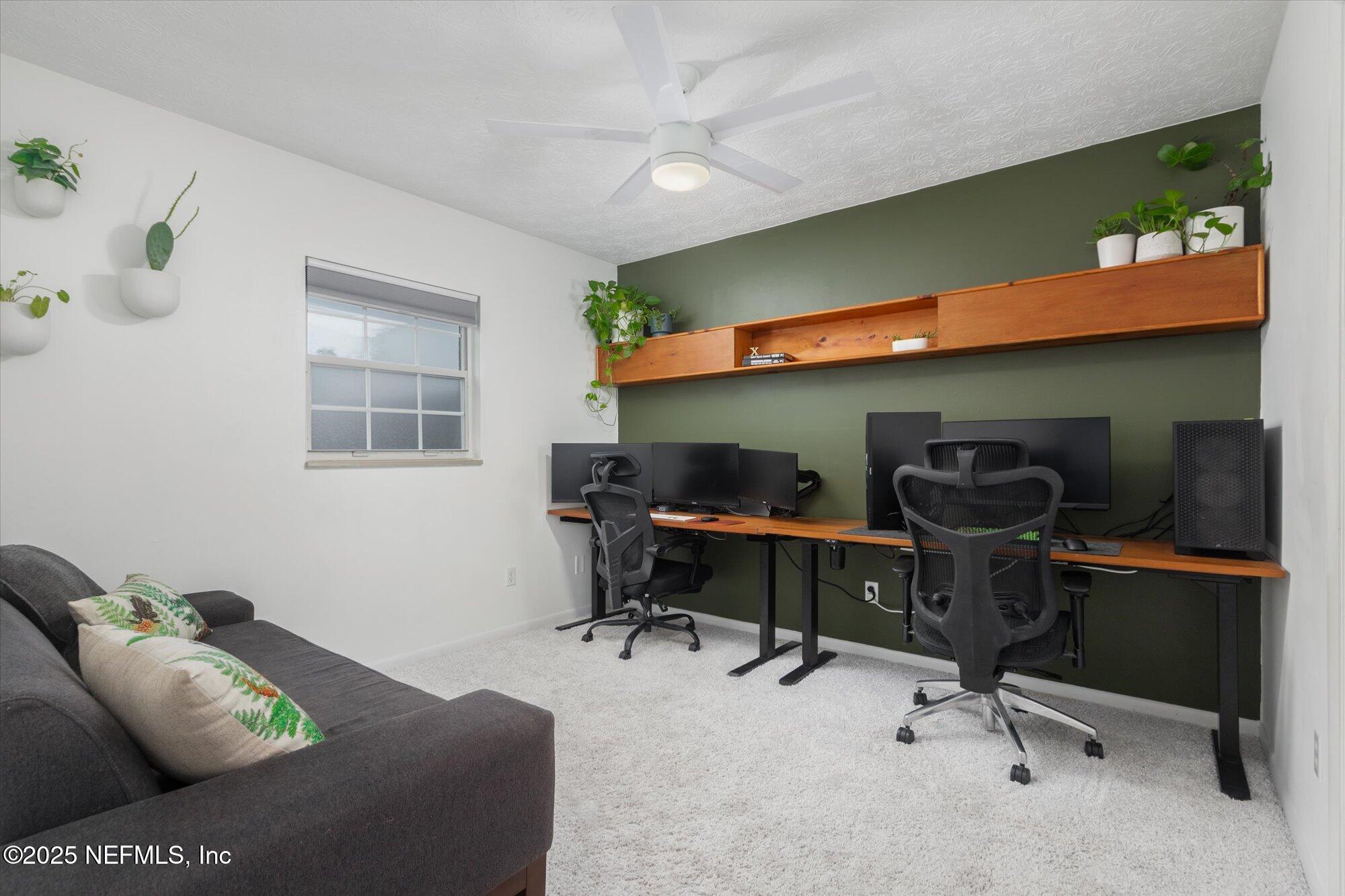 939 Grove Park Drive North Orange Park, FL 32073 - Photo 35 of 57 a workspace with furniture and a workspace