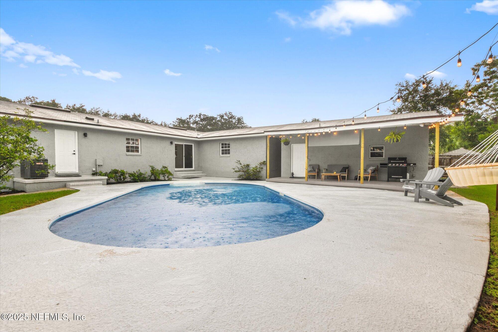 939 Grove Park Drive North Orange Park, FL 32073 - Photo 51 of 57 a view of outdoor space yard and swimming pool