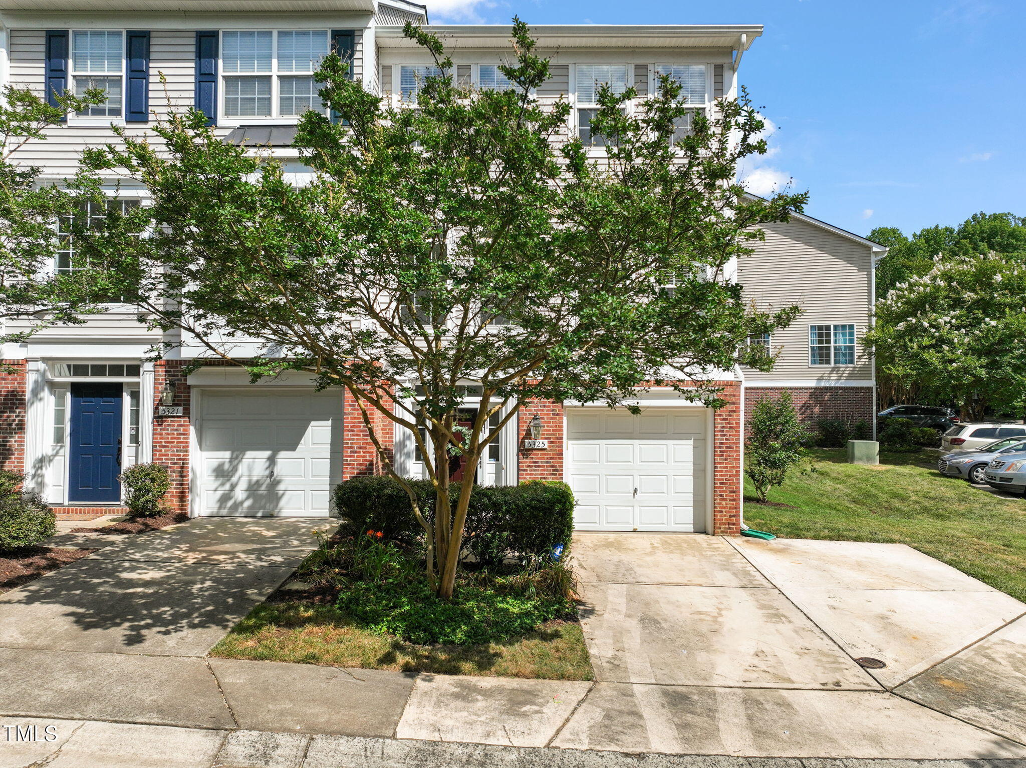 5325 Echo Ridge Road Raleigh, NC 27612 - Photo 1 of 61 a front view of a house with garden