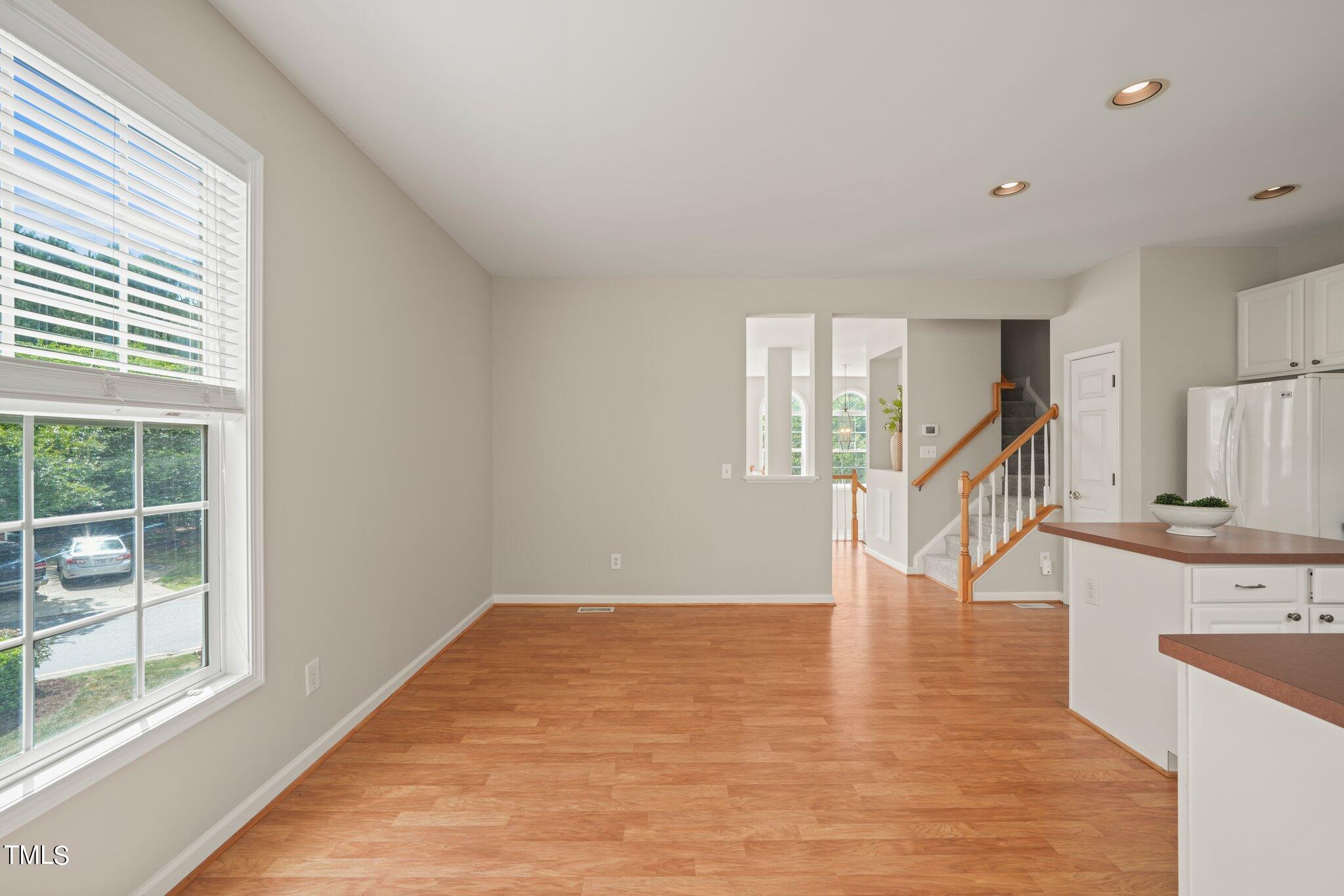 5325 Echo Ridge Road Raleigh, NC 27612 - Photo 11 of 61 a view of entryway and hall with wooden floor