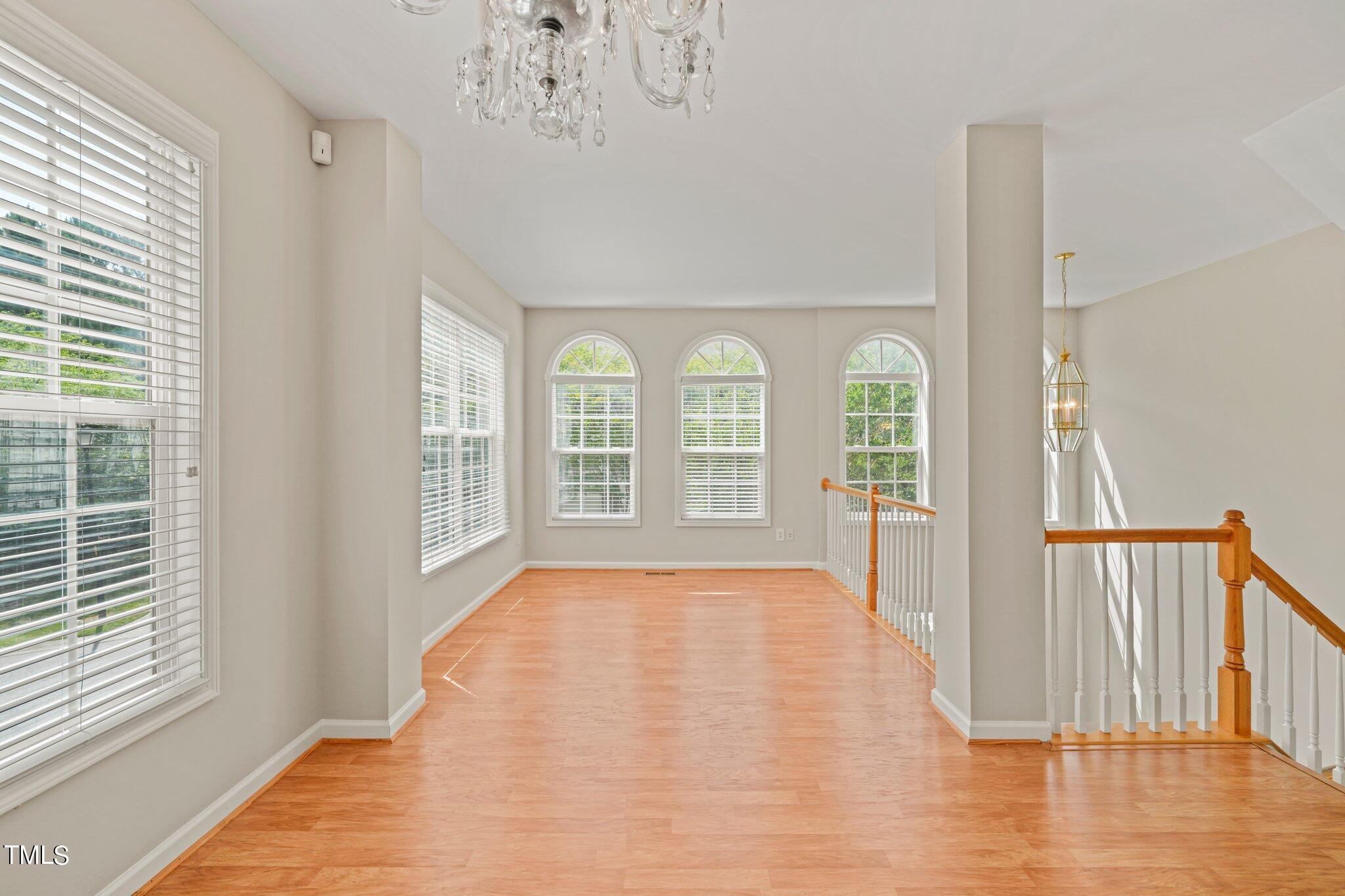 5325 Echo Ridge Road Raleigh, NC 27612 - Photo 19 of 61 a view of an empty room with a window