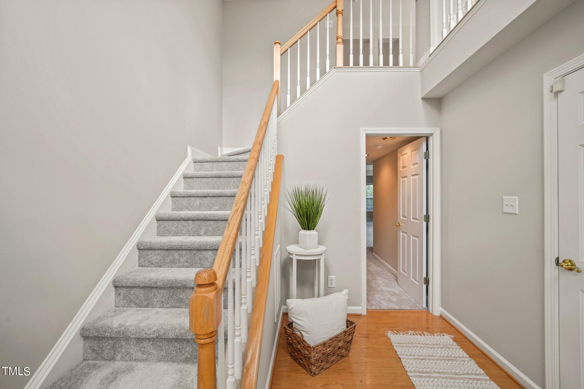 5325 Echo Ridge Road Raleigh, NC 27612 - Photo 4 of 61 a view of entryway and hall with wooden floor