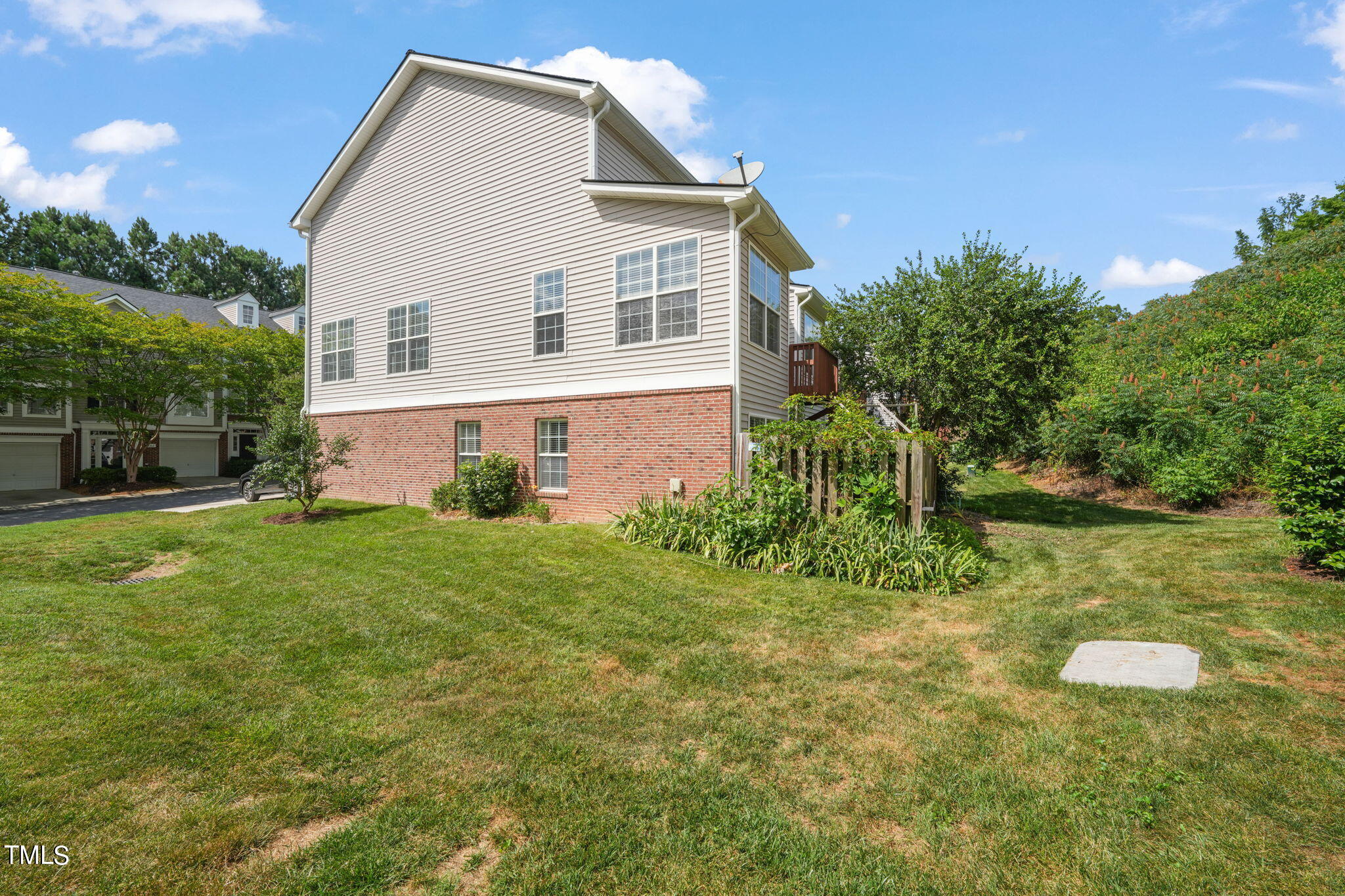 5325 Echo Ridge Road Raleigh, NC 27612 - Photo 50 of 61 a view of a house with a yard