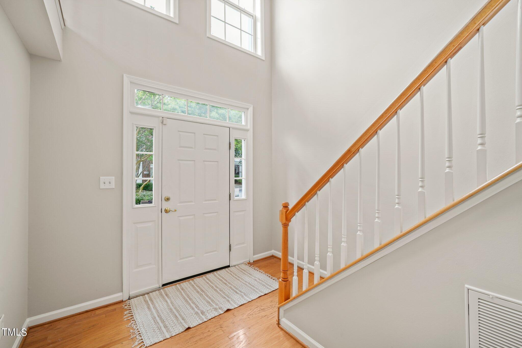 5325 Echo Ridge Road Raleigh, NC 27612 - Photo 5 of 61 a view of an entryway with wooden floor