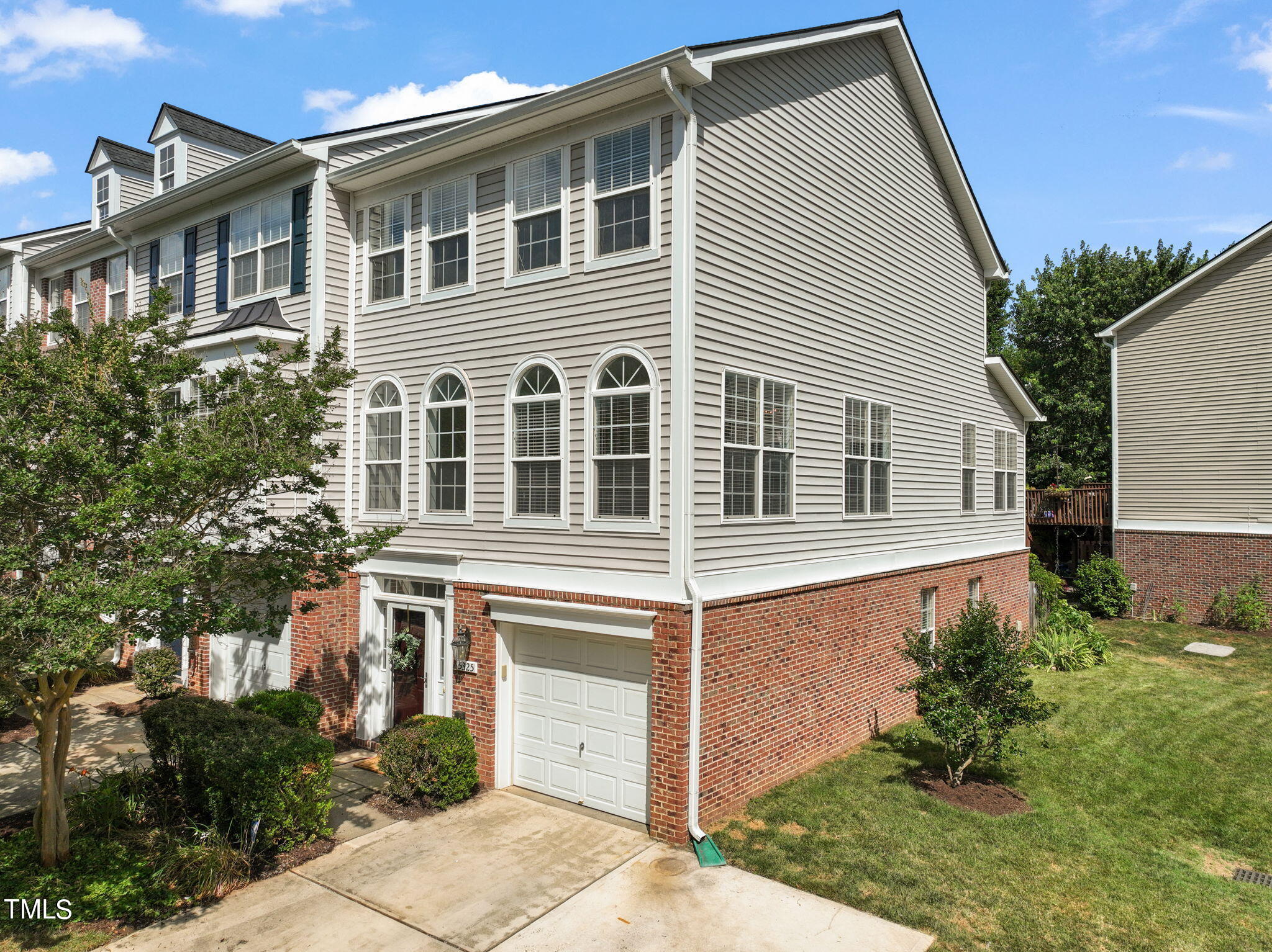 5325 Echo Ridge Road Raleigh, NC 27612 - Photo 53 of 61 a front view of a house with a yard