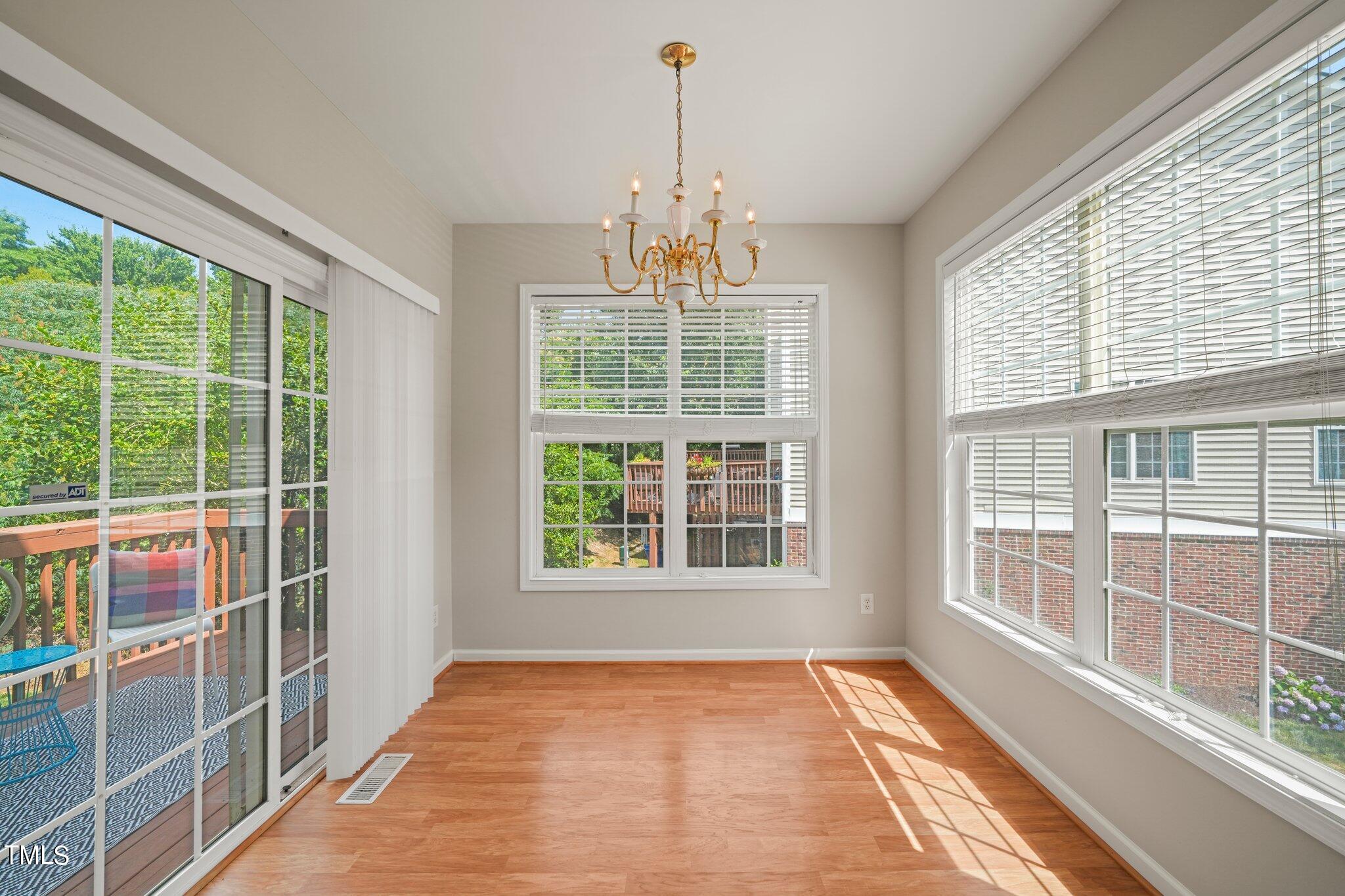 5325 Echo Ridge Road Raleigh, NC 27612 - Photo 6 of 61 a view of empty room with large window