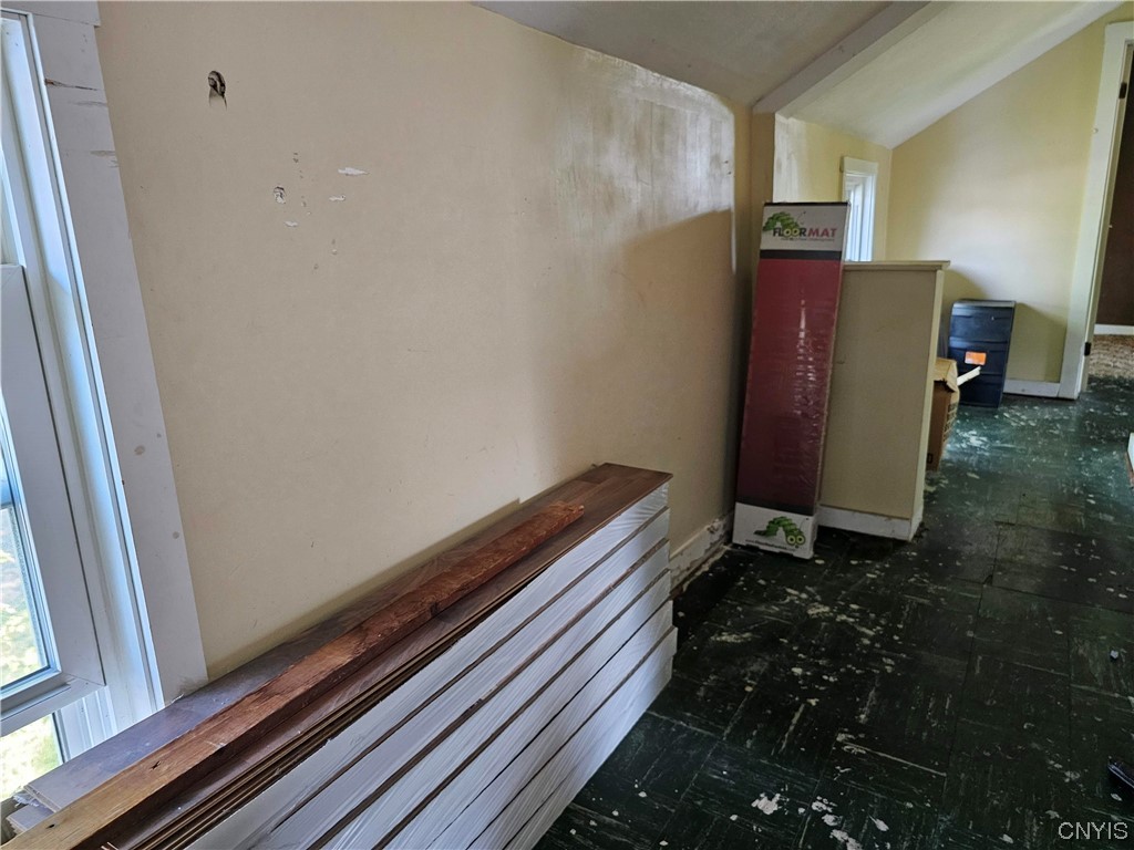 605 Buckley Road Salina, NY 13088 - Photo 22 of 33 New laminate flooring conveys, ready for new owner