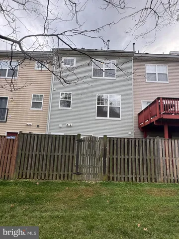 a view of a park with swings and slides