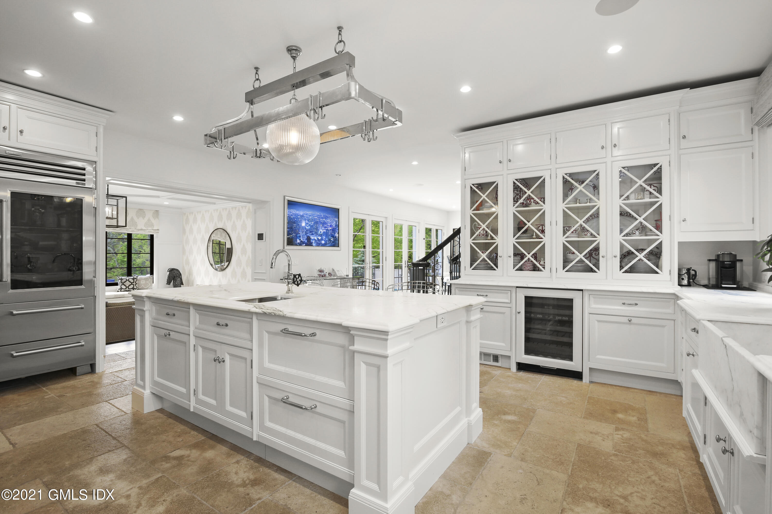 200 Stanwich Road Greenwich, CT 06830 - Photo 30 of 80 a kitchen with stainless steel appliances kitchen island granite countertop a stove and a sink