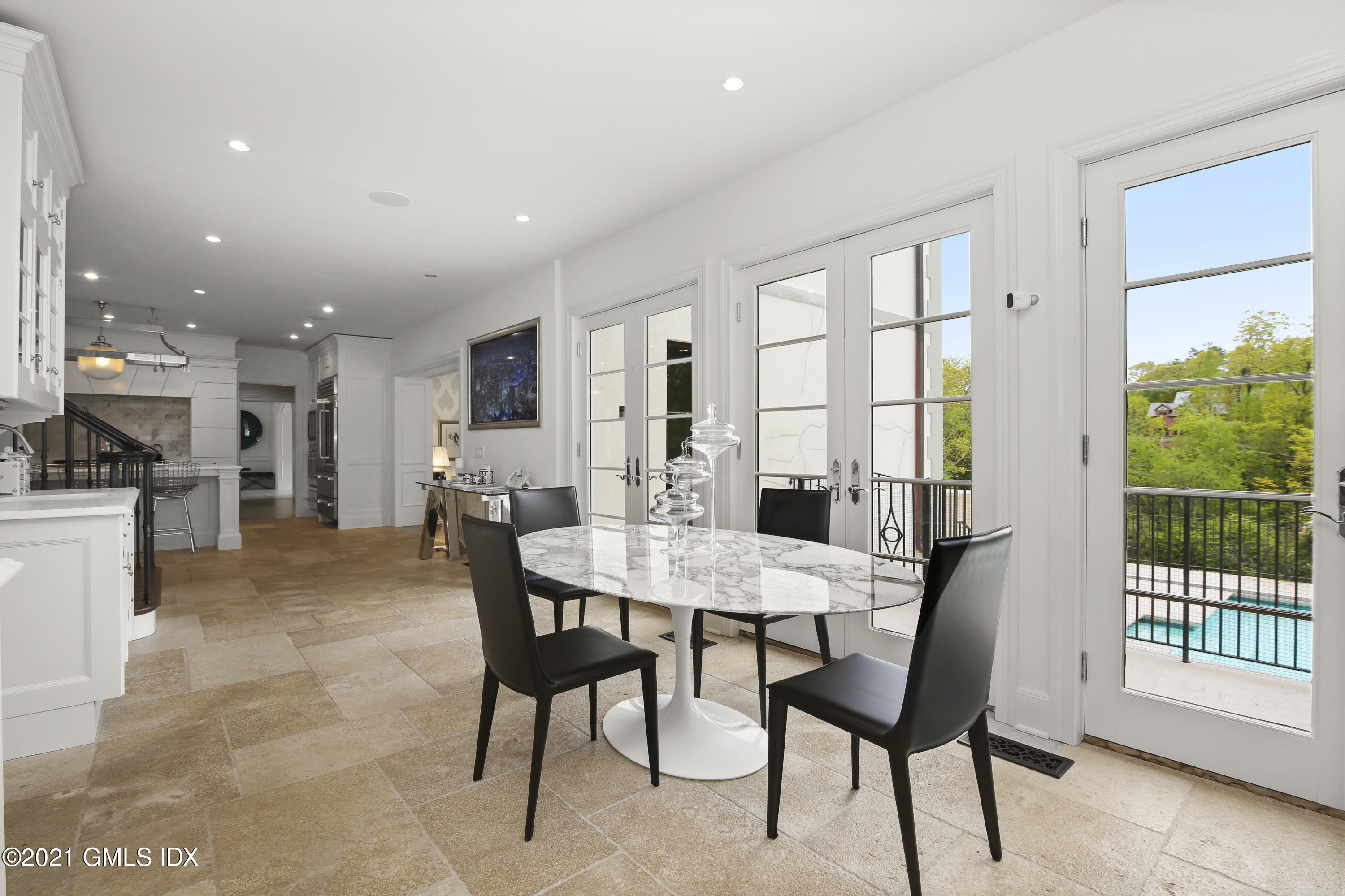 200 Stanwich Road Greenwich, CT 06830 - Photo 34 of 80 a view of a dining room with furniture and a table