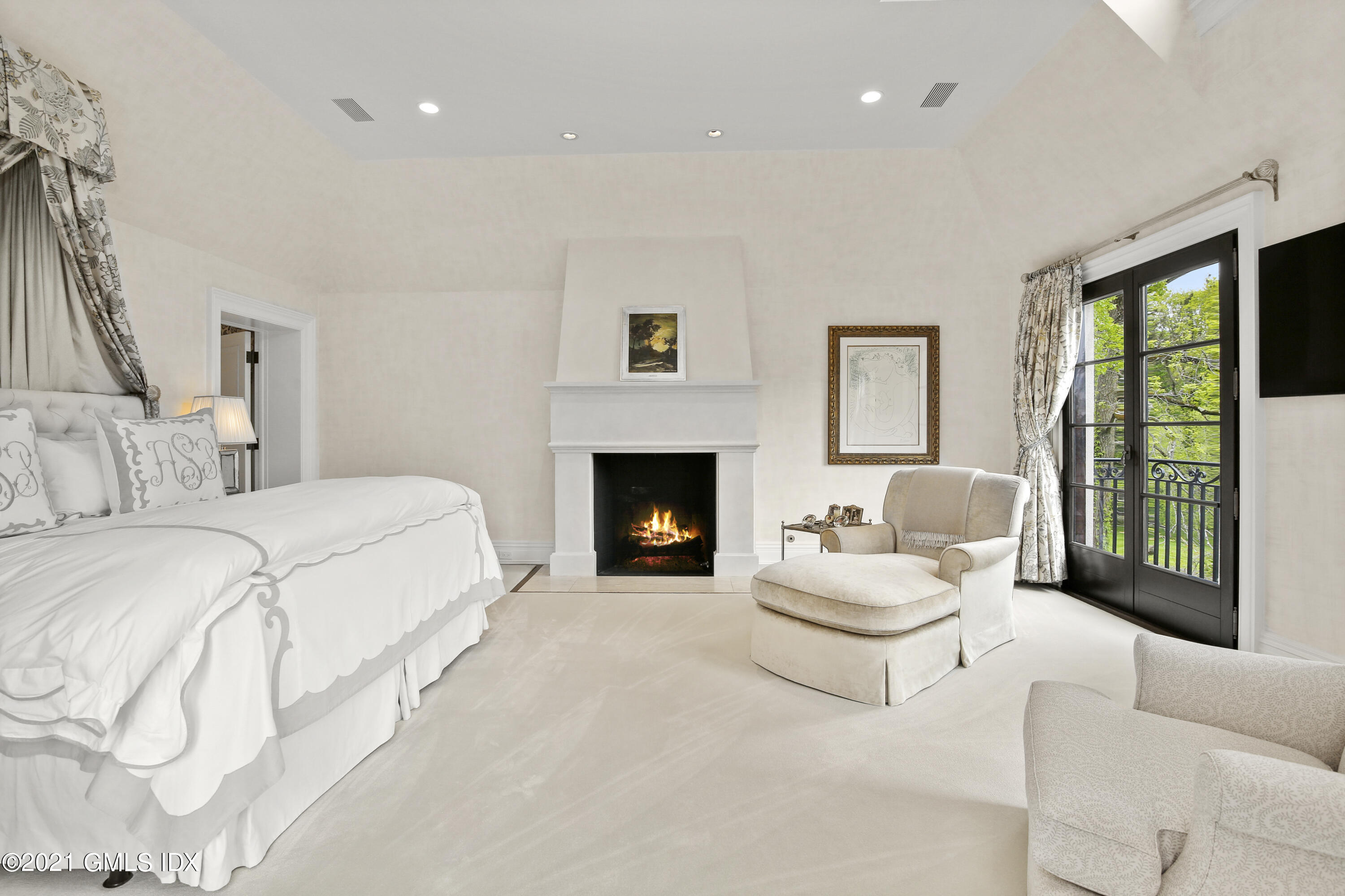 200 Stanwich Road Greenwich, CT 06830 - Photo 44 of 80 a bedroom with a large bed and a large window