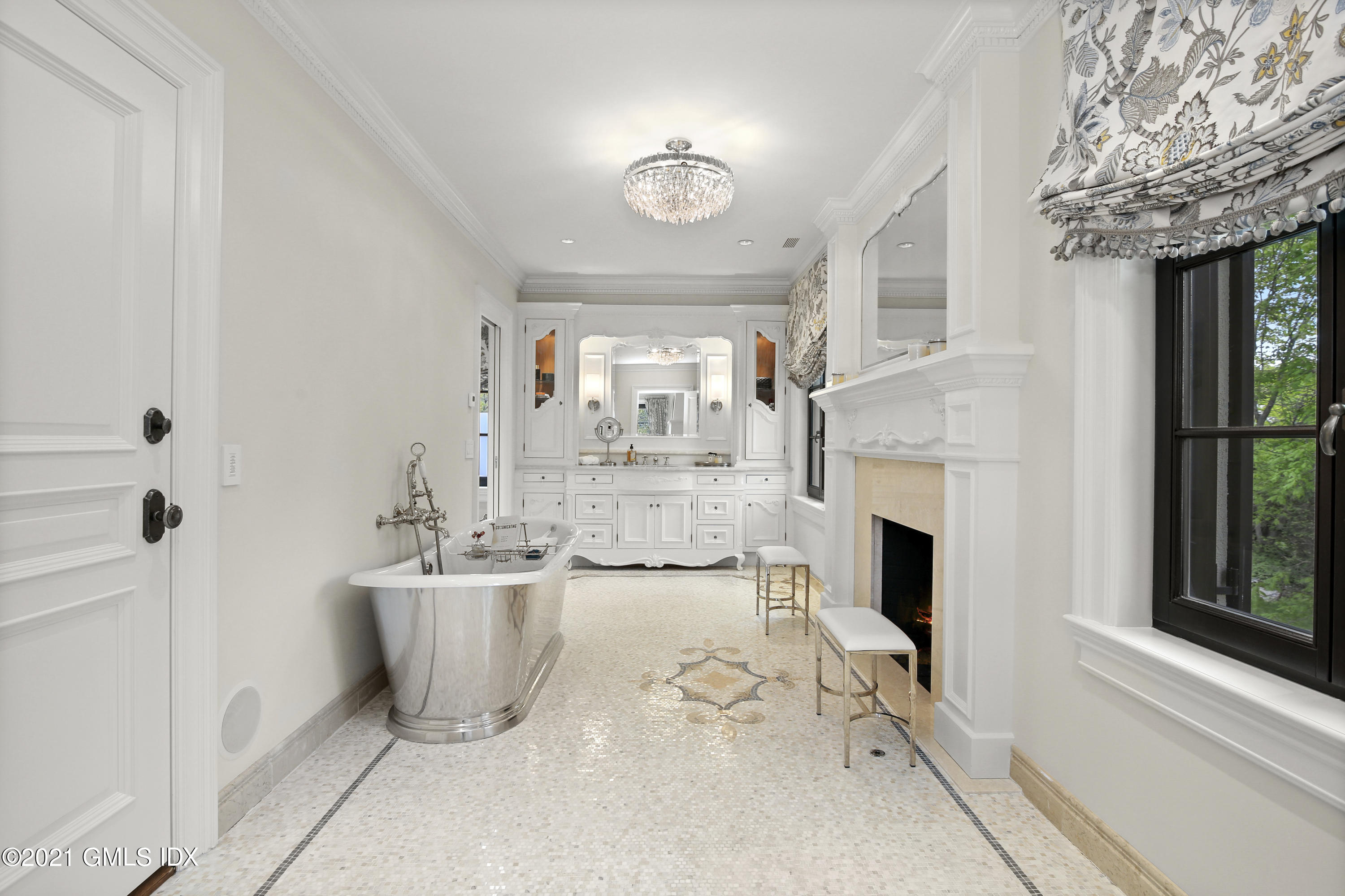 200 Stanwich Road Greenwich, CT 06830 - Photo 46 of 80 a living room with furniture a fireplace and a large window