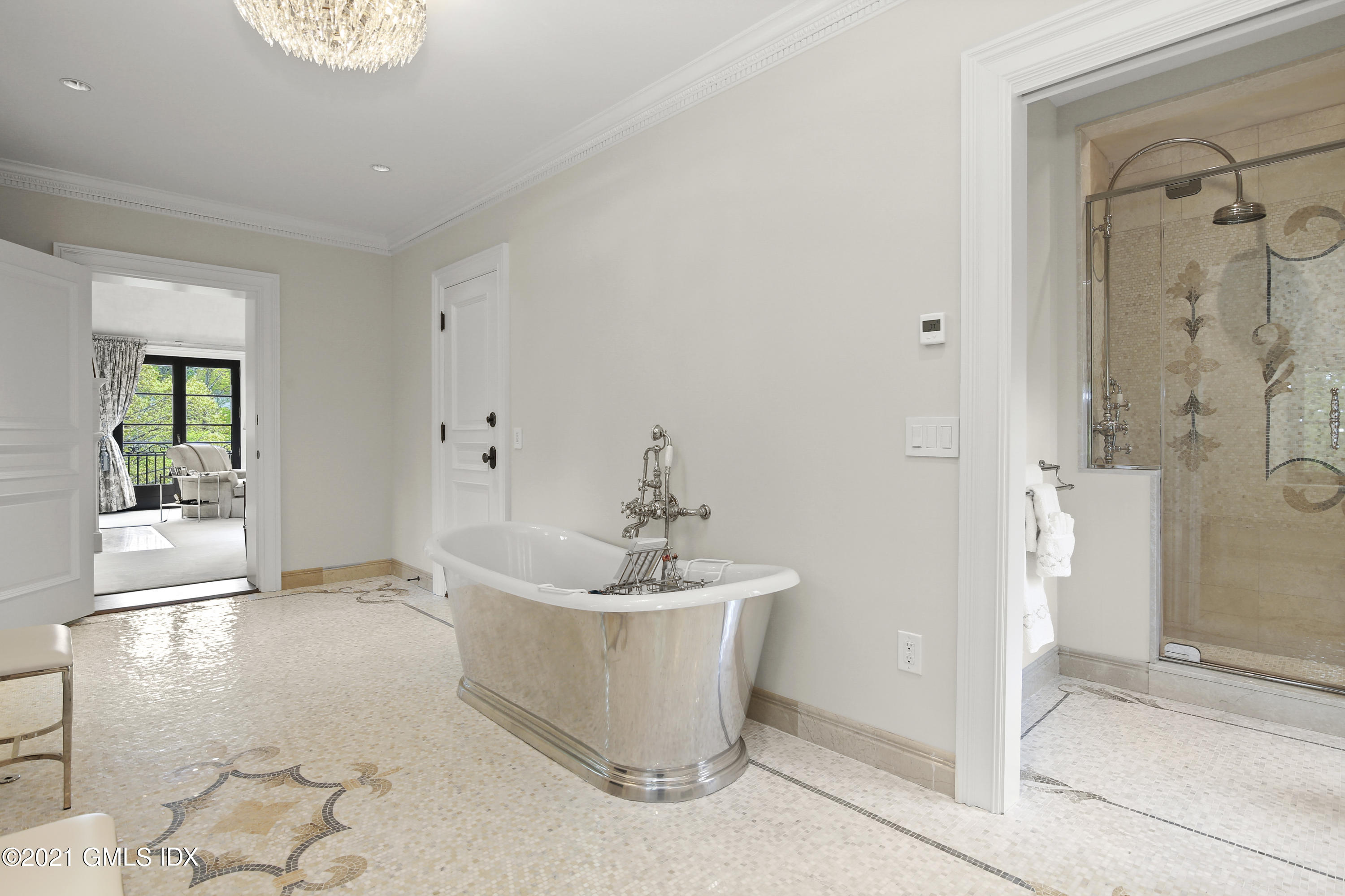 200 Stanwich Road Greenwich, CT 06830 - Photo 47 of 80 a bathroom with a sink a mirror and a shower