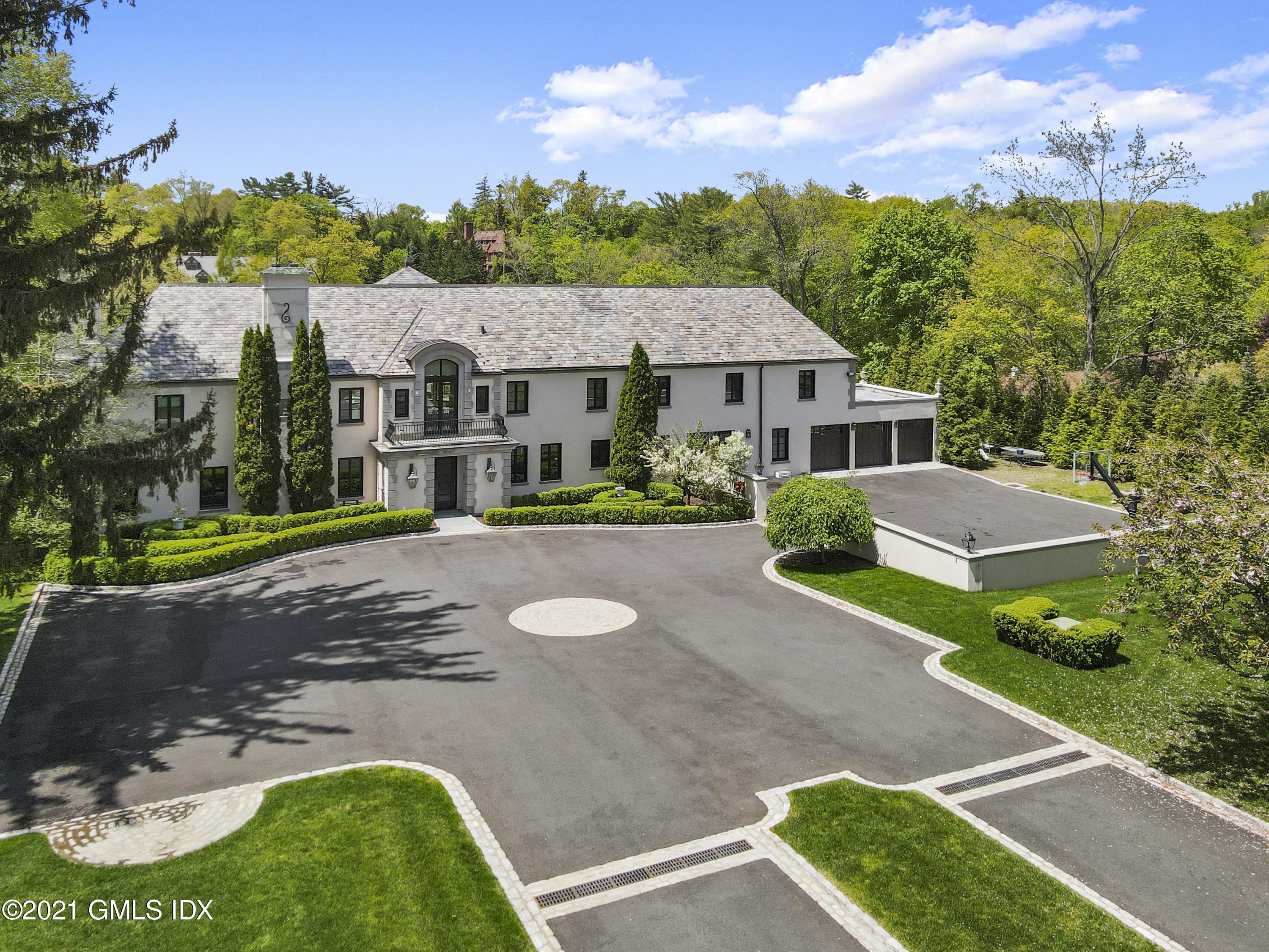 200 Stanwich Road Greenwich, CT 06830 - Photo 9 of 80 a view of a house with a patio