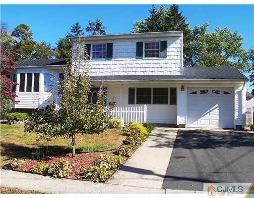 17 Hansen Road Old Bridge, NJ 08857 - Photo 2 of 21 a front view of a house with a yard