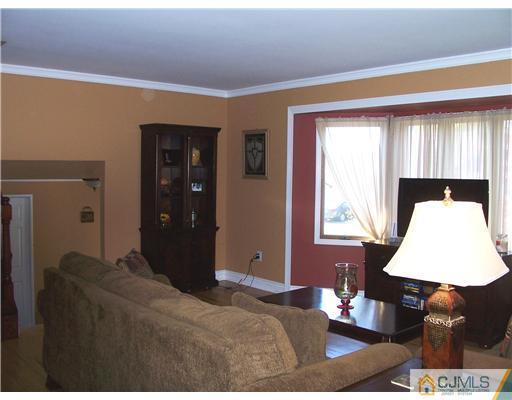 17 Hansen Road Old Bridge, NJ 08857 - Photo 4 of 21 a bedroom with a bed and window