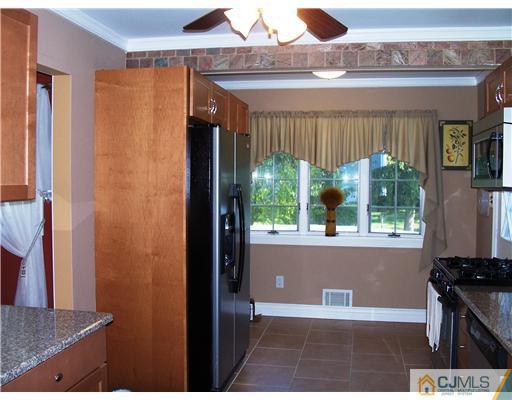 17 Hansen Road Old Bridge, NJ 08857 - Photo 9 of 21 a view of outdoor space window and kitchen view