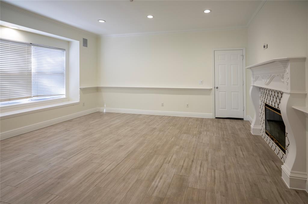 413 Ridge Meade Drive Lewisville, TX 75067 - Photo 17 of 37 Flex living room with built in gas fireplace. The can be great with playroom, office, gym, etc