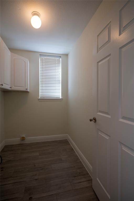 413 Ridge Meade Drive Lewisville, TX 75067 - Photo 35 of 37 Laundry room with built in utility sink and built in cabinets