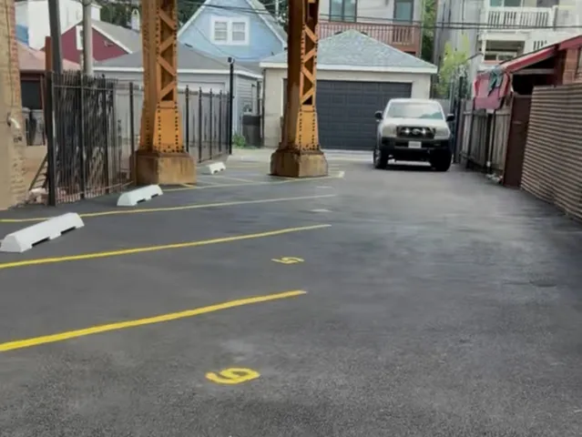 a view of a street with cars