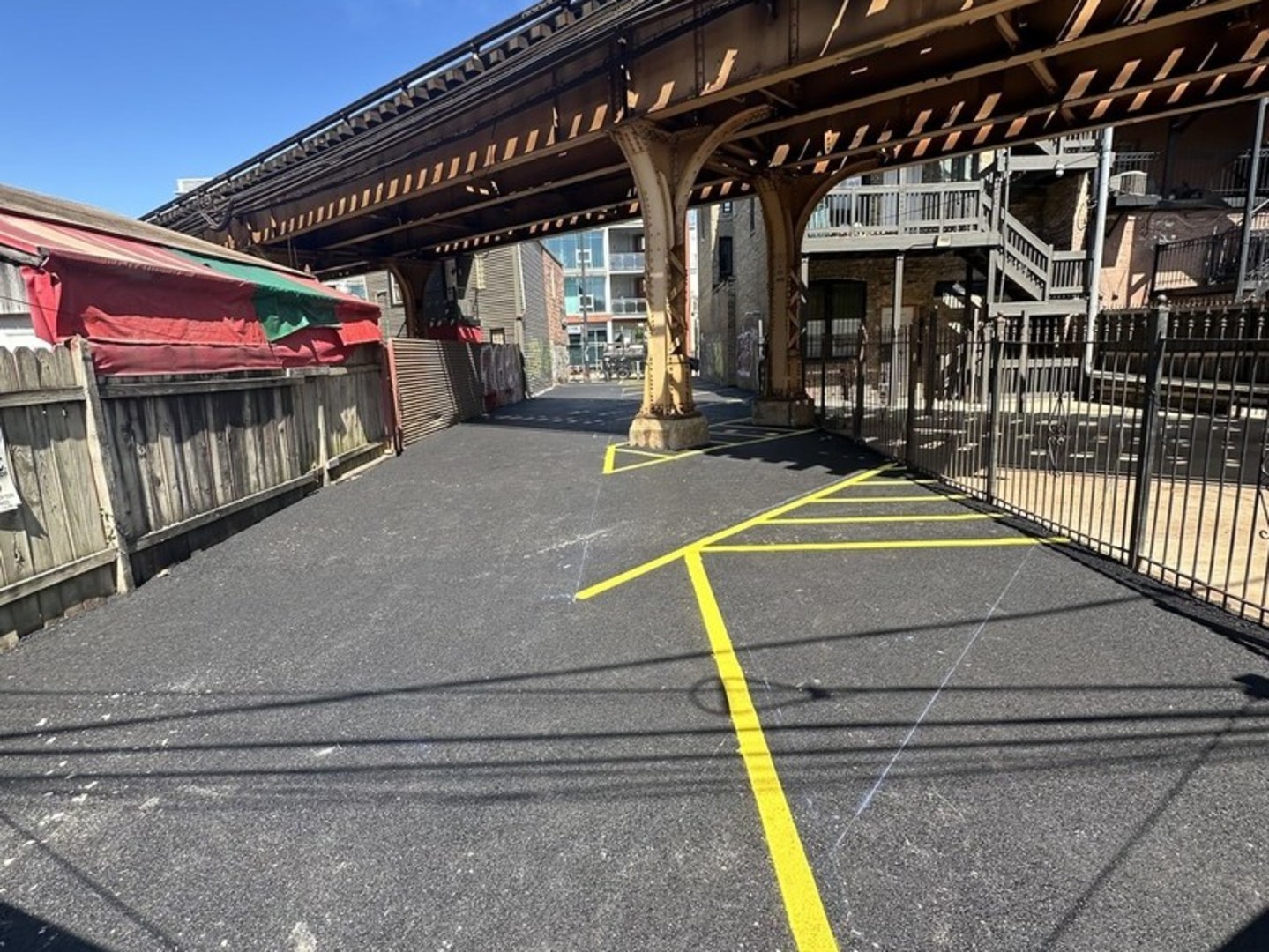2443 West Armitage Avenue, Unit PARKING Chicago, IL 60647 - Photo 3 of 3 a view of a swimming pool with a patio