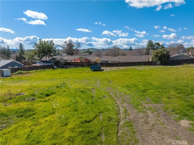 a view of a house with a big yard