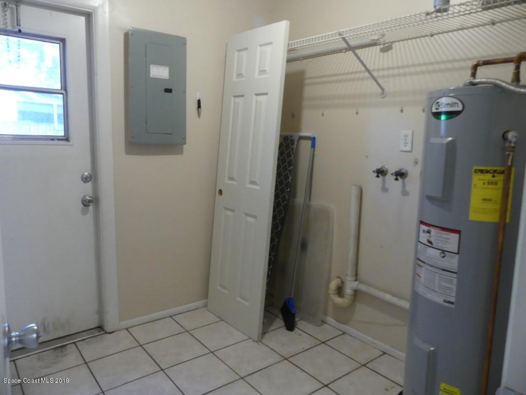 4730 Ivan Street Cocoa, FL 32927 - Photo 19 of 23 a bathroom with a shower and a sink