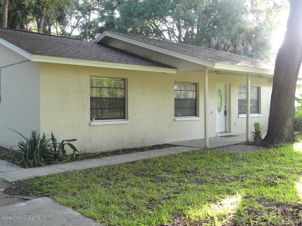 4730 Ivan Street Cocoa, FL 32927 - Photo 22 of 23 a view of a house with backyard and garden
