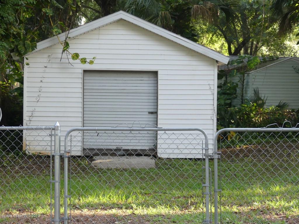 4730 Ivan Street Cocoa, FL 32927 - Photo 23 of 23 a view of house with backyard