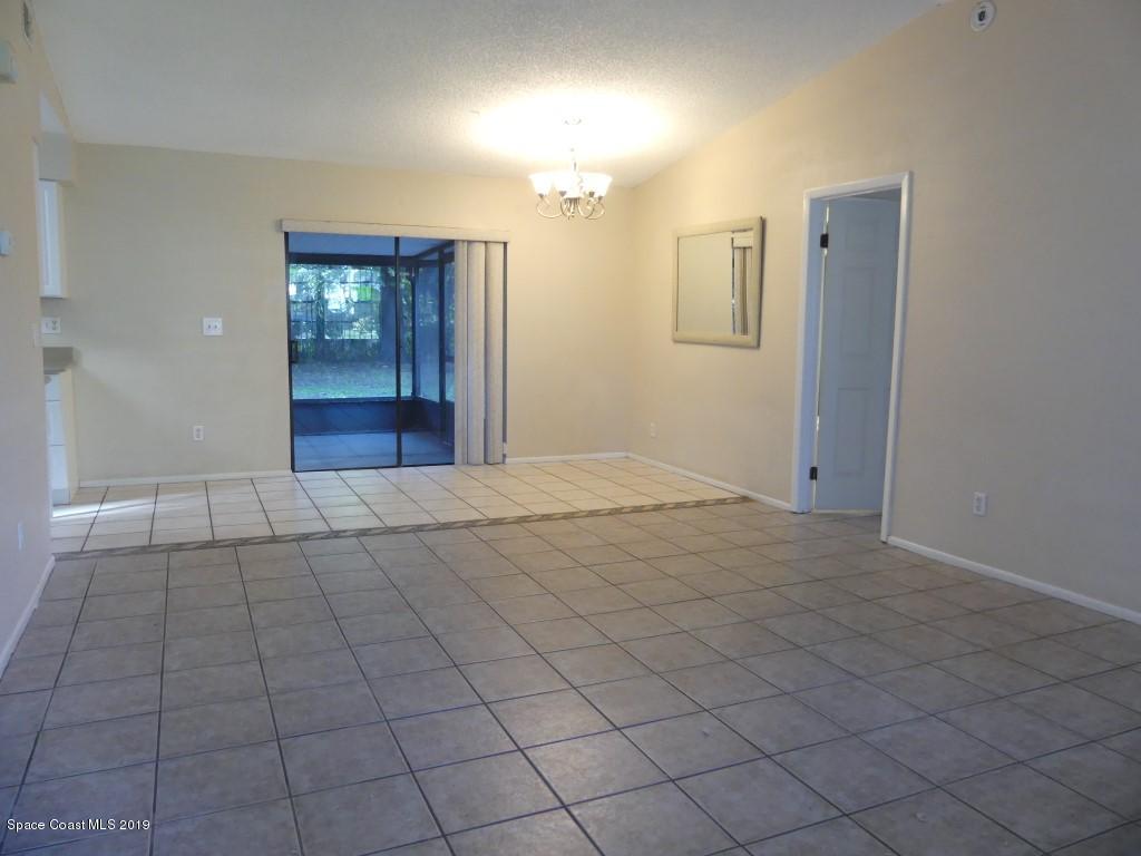 4730 Ivan Street Cocoa, FL 32927 - Photo 4 of 23 en empty room with mirror and shower