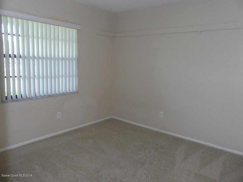 4730 Ivan Street Cocoa, FL 32927 - Photo 10 of 23 an empty room with a window