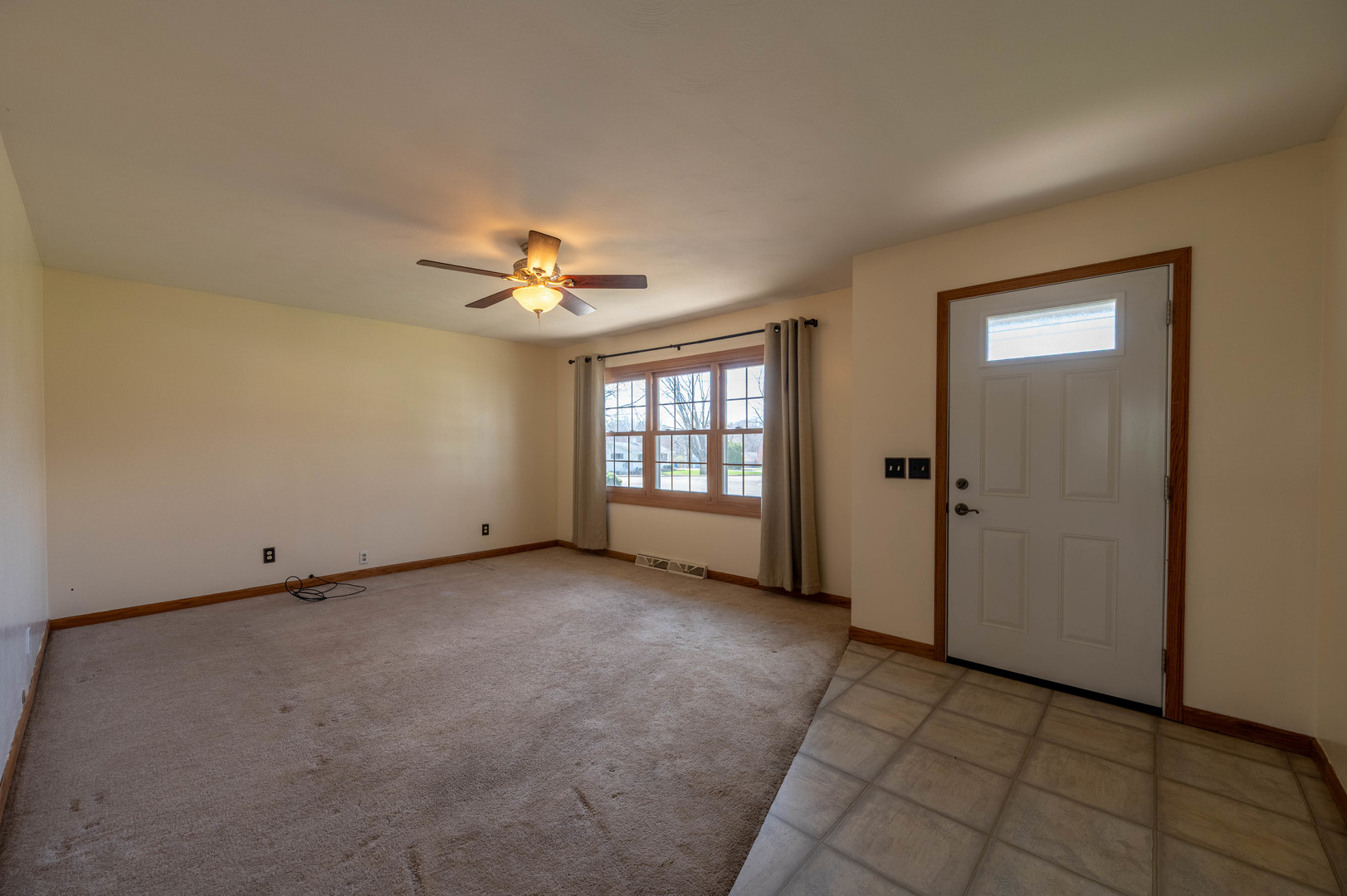 1018 Tee Street Dixon, IL 61021 - Photo 12 of 31 a view of an empty room with a window