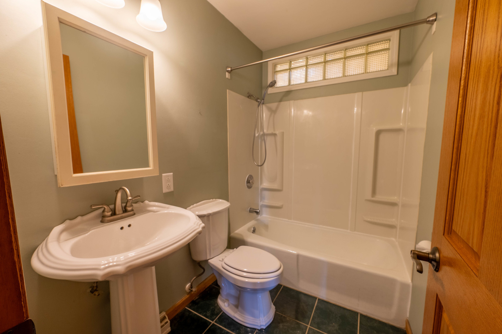 1018 Tee Street Dixon, IL 61021 - Photo 13 of 31 a bathroom with a sink toilet and shower