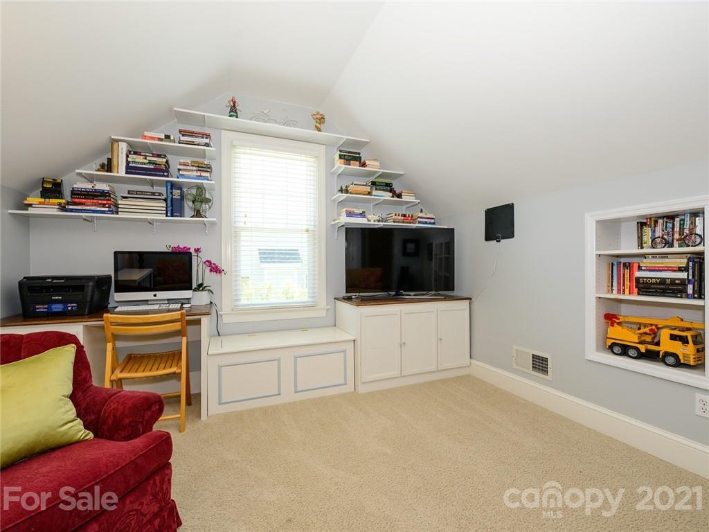 106 Morrison Hill Road Davidson, NC 28036 - Photo 22 of 33 a living room with furniture and a flat screen tv