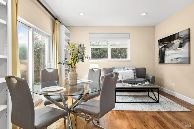 a view of a dining room with furniture window and outside view