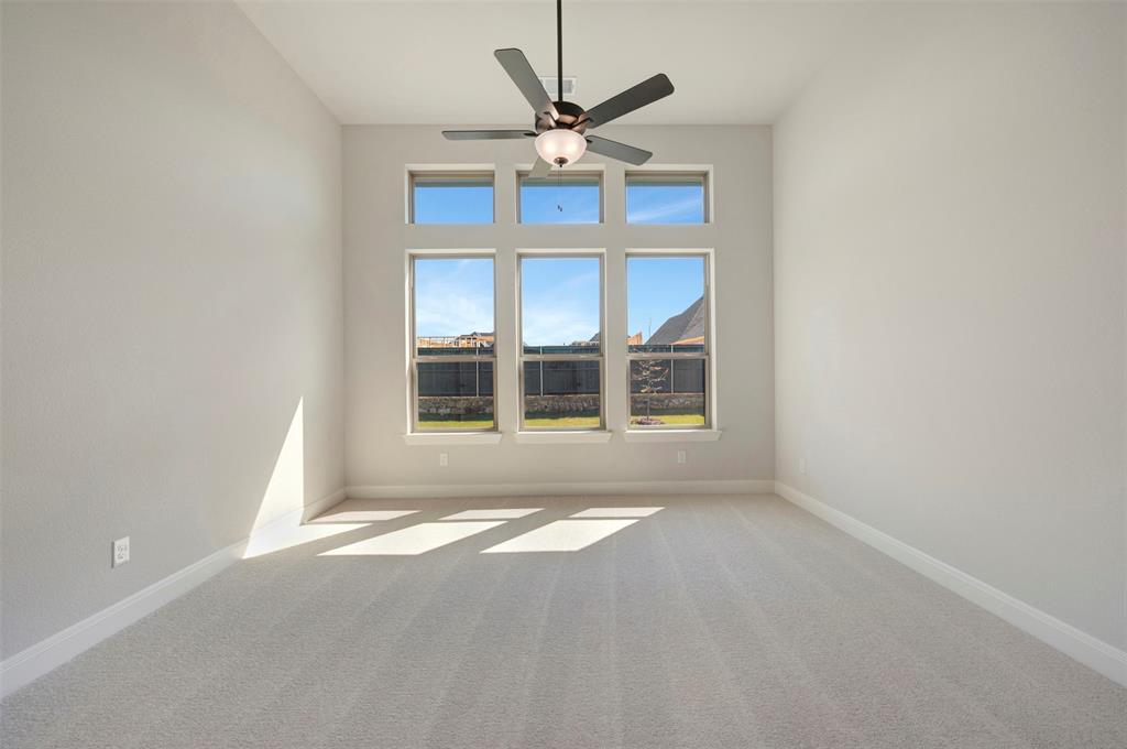 3575 Redbud Flower Trail Venus, TX 76084 - Photo 30 of 36 Spare room with light carpet and a ceiling fan