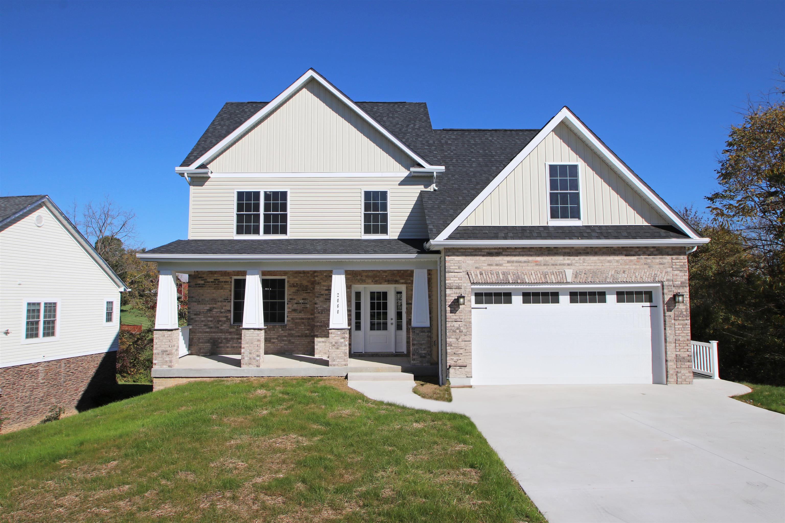 2060 Willow Hill Drive Harrisonburg, VA 22801 - Photo 1 of 43 a front view of a house with a yard and potted plants