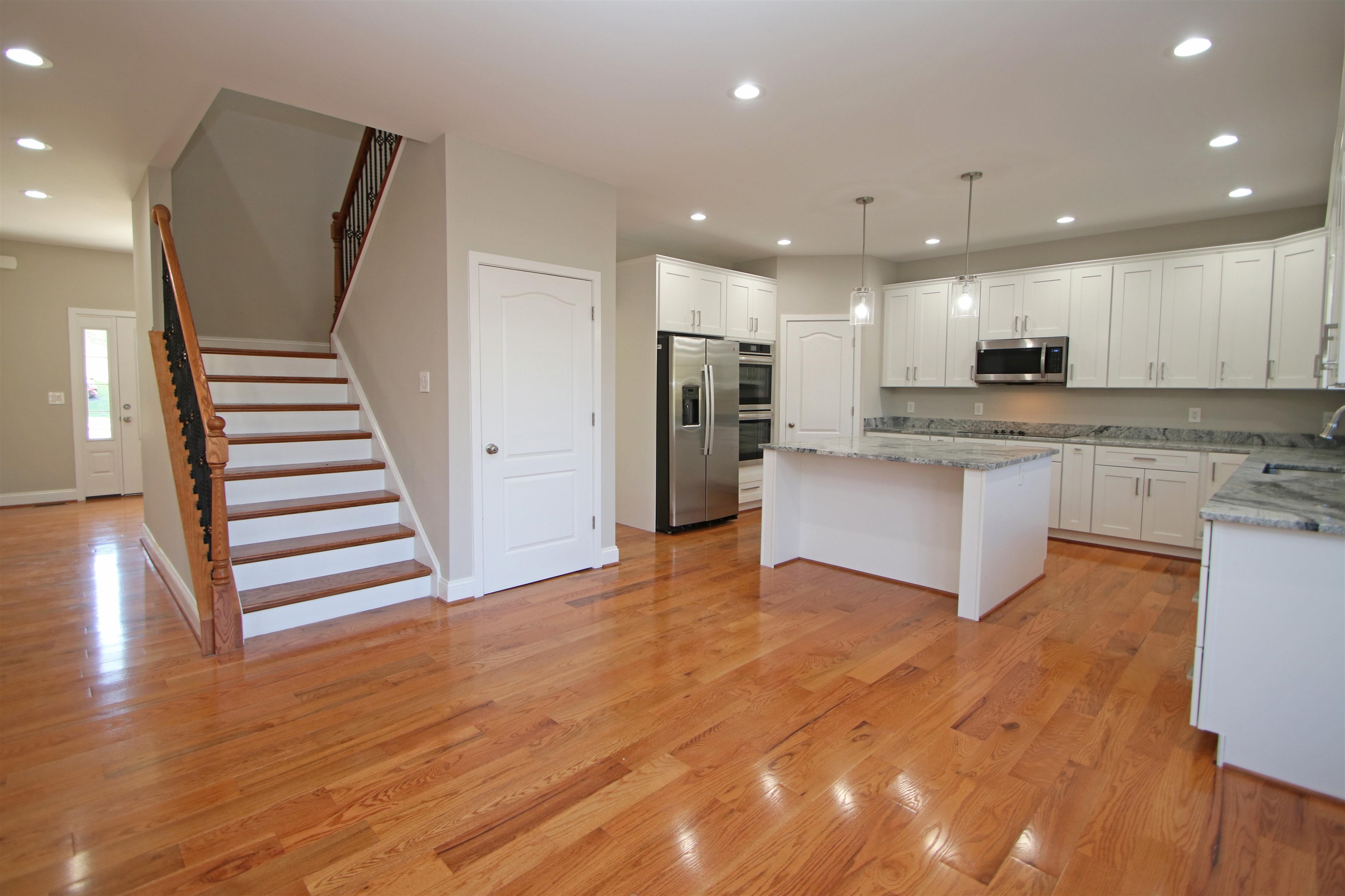 2060 Willow Hill Drive Harrisonburg, VA 22801 - Photo 11 of 43 a view of kitchen with refrigerator microwave and wooden floor