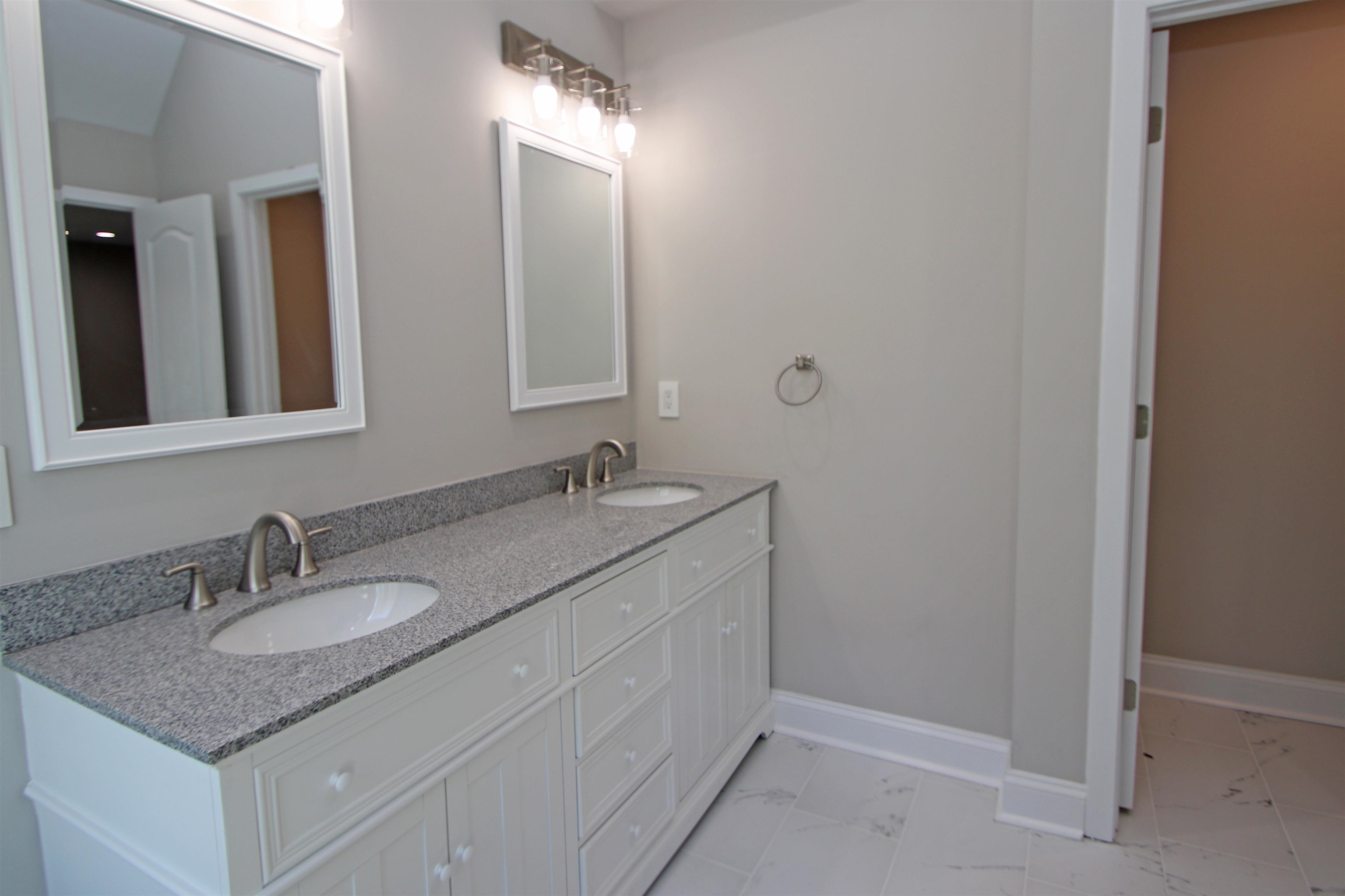 2060 Willow Hill Drive Harrisonburg, VA 22801 - Photo 22 of 43 a bathroom with a granite countertop sink and a mirror